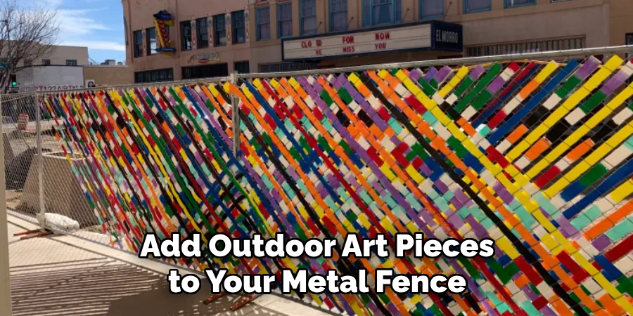 Add Outdoor Art Pieces to Your Metal Fence