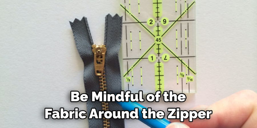 Be Mindful of the Fabric Around the Zipper
