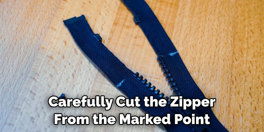 Carefully Cut the Zipper From the Marked Point