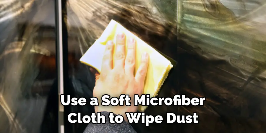 Use a Soft Microfiber Cloth to Wipe Dust