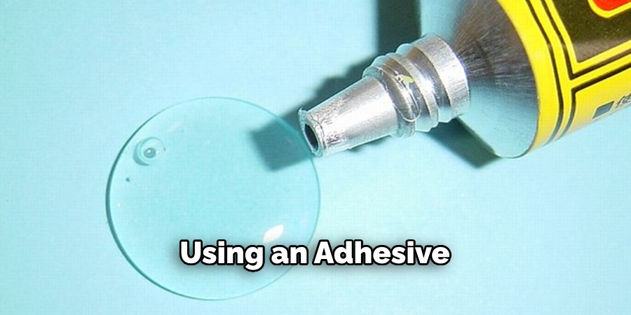 Using an Adhesive