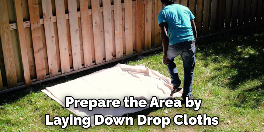 Prepare the Area by Laying Down Drop Cloths 