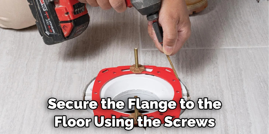 Secure the Flange to the Floor Using the Screws