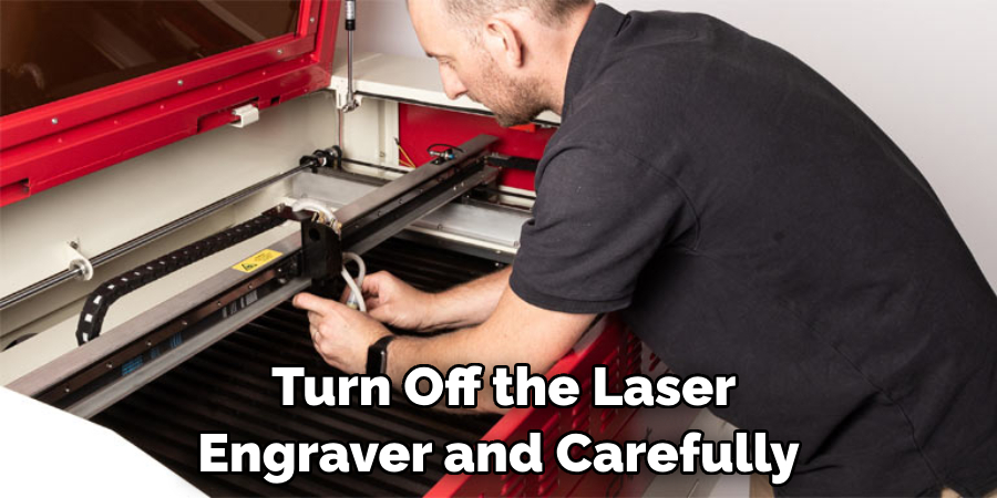 Turn Off the Laser Engraver and Carefully