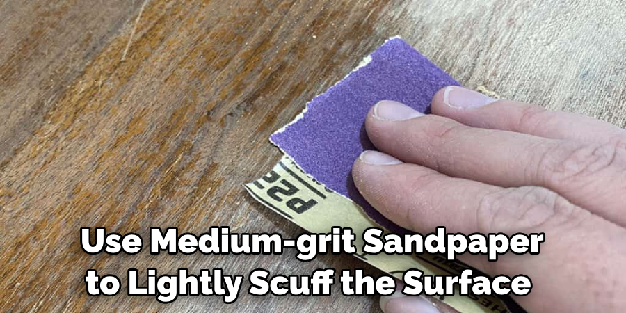 Use Medium-grit Sandpaper to Lightly Scuff the Surface