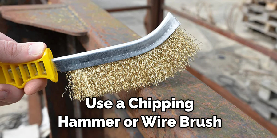 Use a Chipping Hammer or Wire Brush