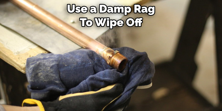 Use a Damp Rag 
To Wipe Off