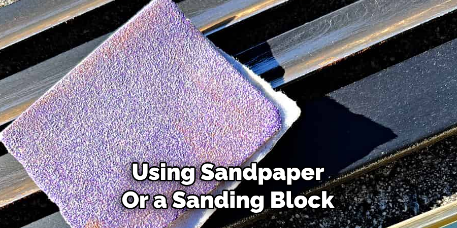 Using Sandpaper Or a Sanding Block