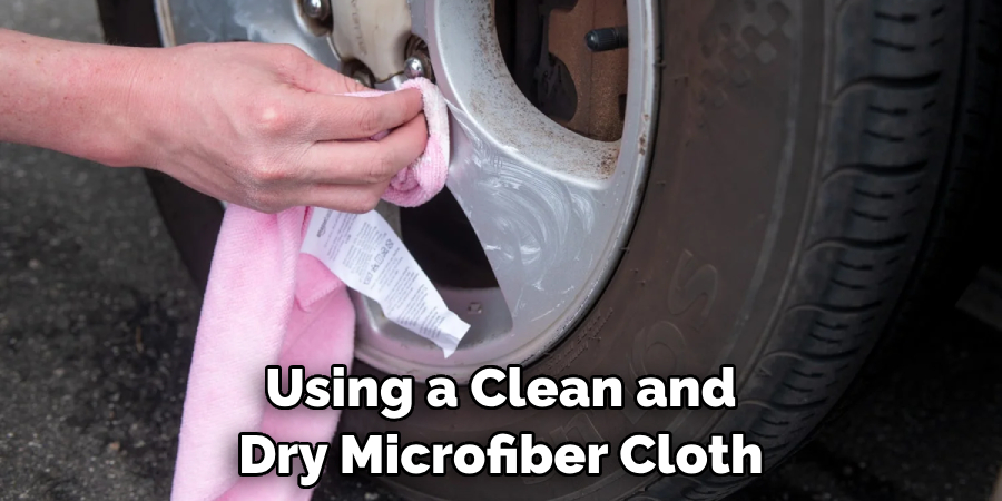 Using a Clean and Dry Microfiber Cloth