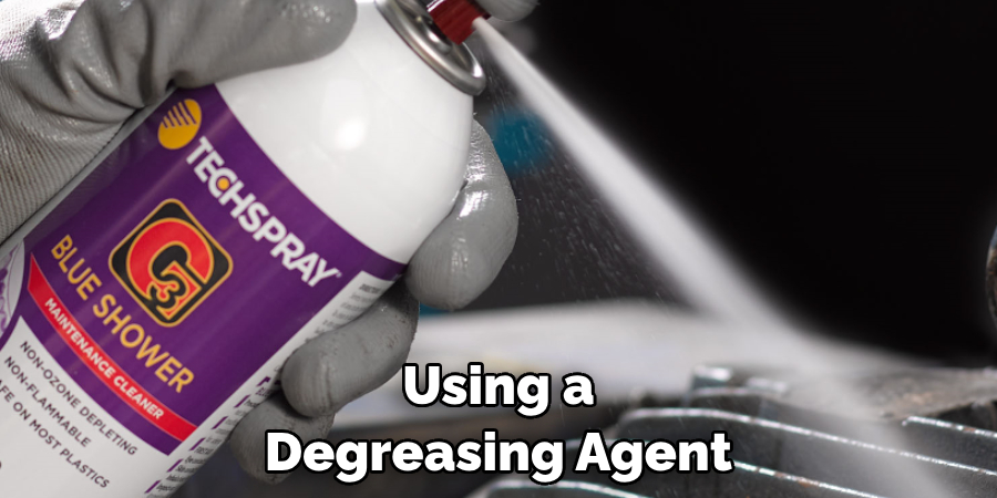 Using a Degreasing Agent