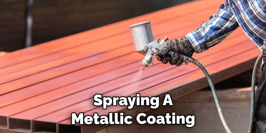 Spraying A Metallic Coating 
