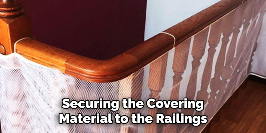 Securing the Covering Material to the Railings