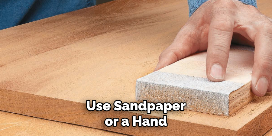 Use Sandpaper or a Hand