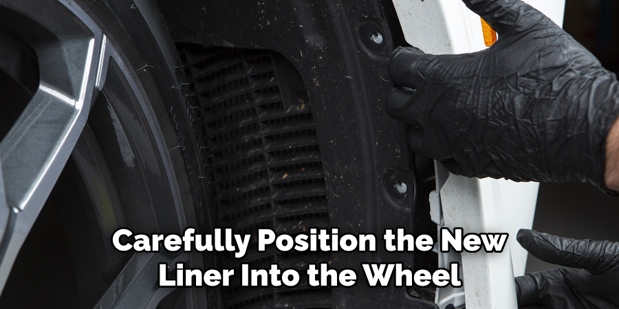 Carefully Position the New Liner Into the Wheel