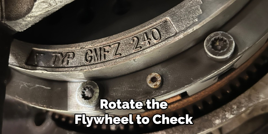 Rotate the Flywheel to Check