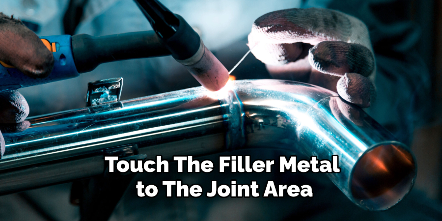 Touch the Filler Metal to the Joint Area