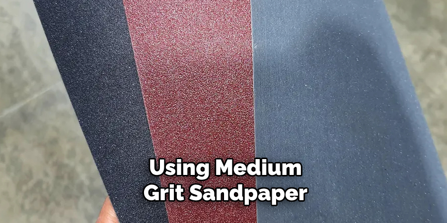 Using Medium-grit Sandpaper