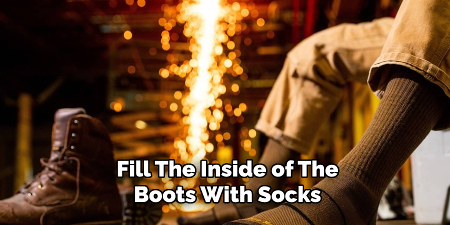 Fill the Inside of the Boots With Socks