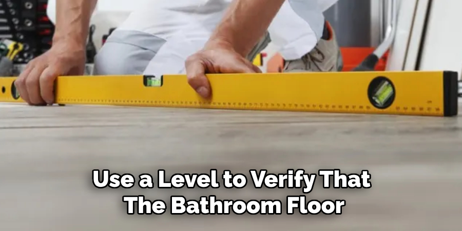 Use a Level to Verify That the Bathroom Floor