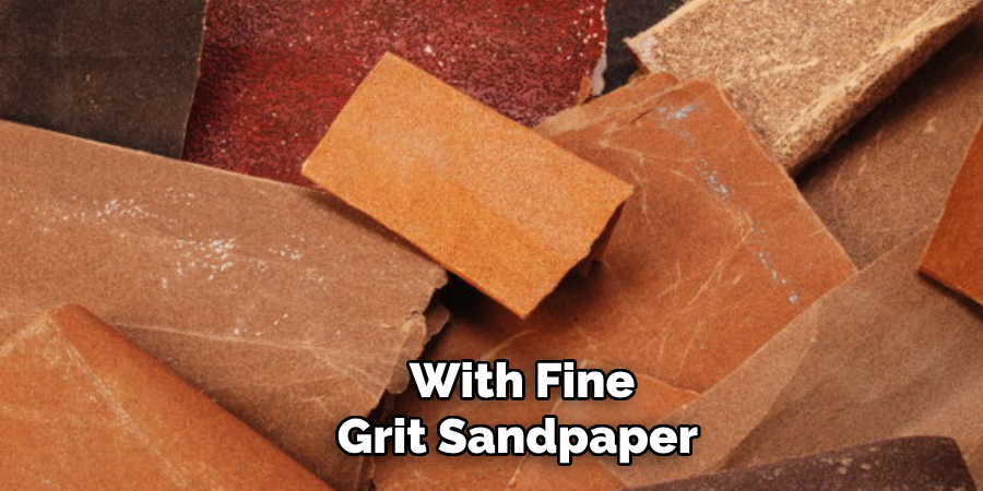 With Fine-grit Sandpaper