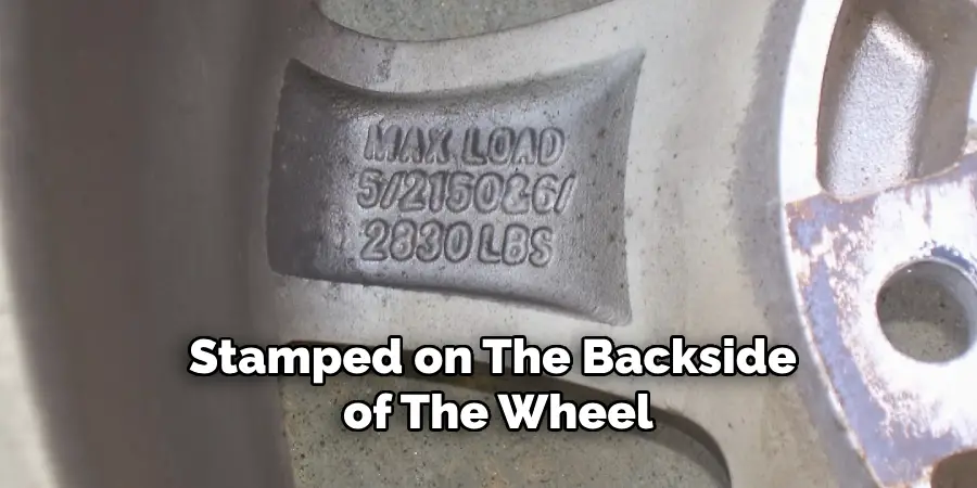 stamped on the backside of the wheel