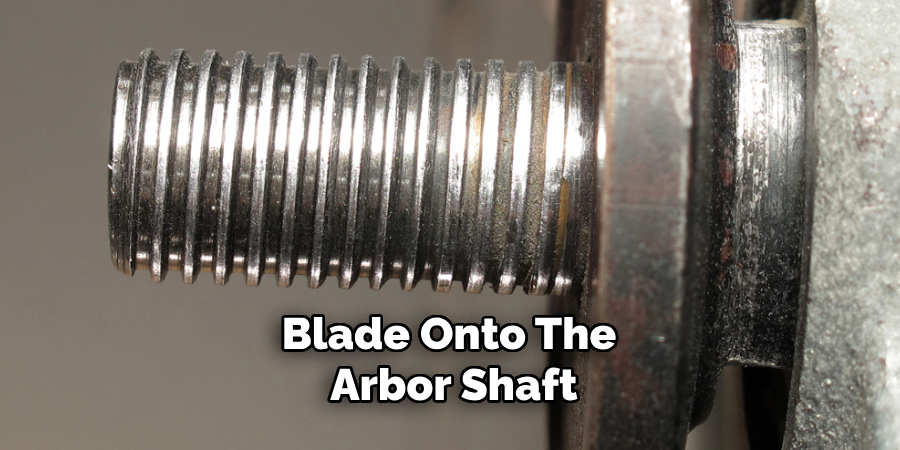 Blade Onto the Arbor Shaft