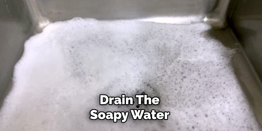 Drain the Soapy Water 