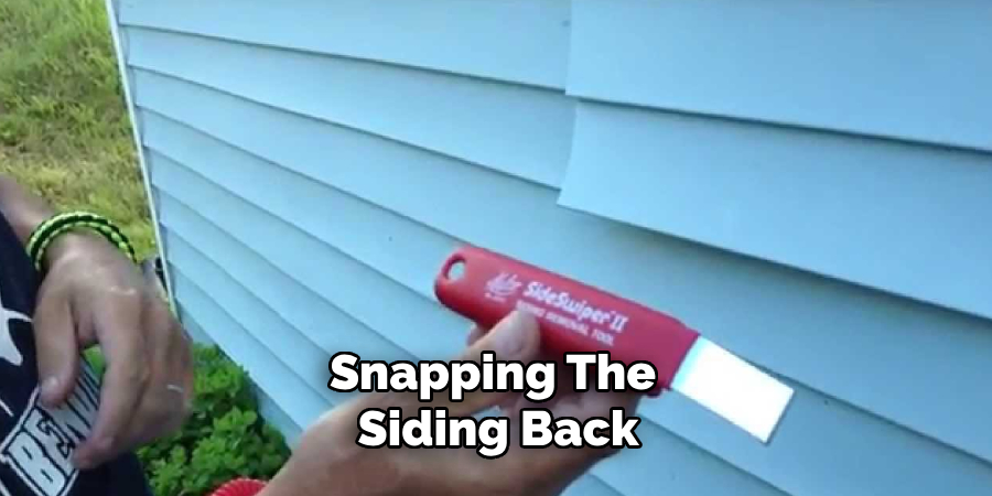 Snapping the Siding Back