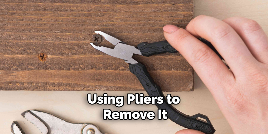 Using Pliers to Remove It