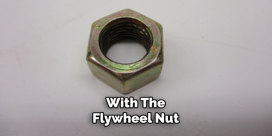 With the Flywheel Nut 