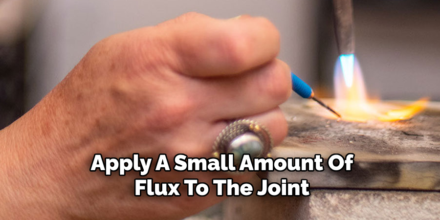 Apply A Small Amount Of
Flux To The Joint