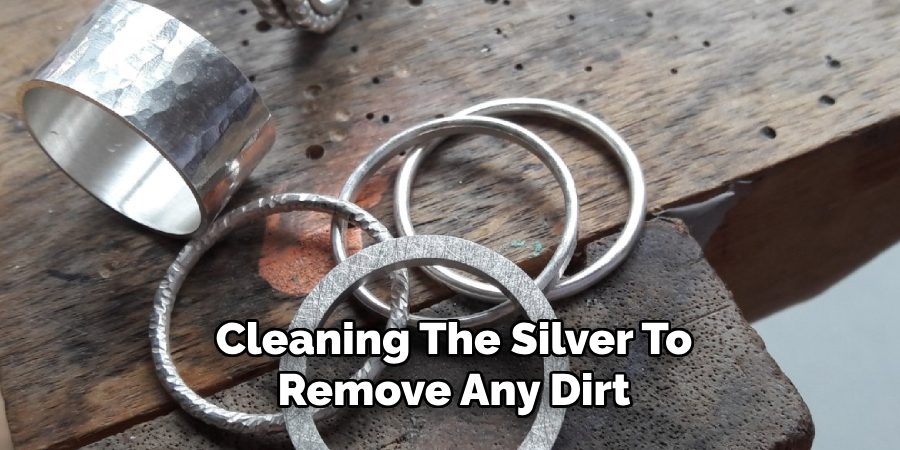 Cleaning The Silver To
Remove Any Dirt