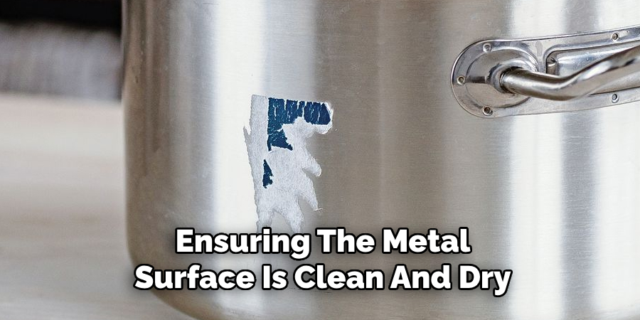 Ensuring The Metal
Surface Is Clean And Dry