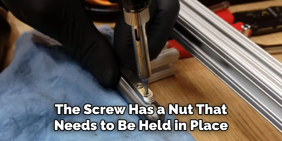 The Screw Has a Nut That Needs to Be Held in Place