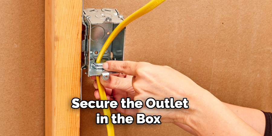 Secure the Outlet in the Box