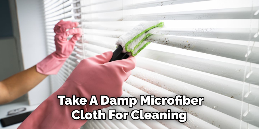 Take A Damp Microfiber
Cloth For Cleaning 