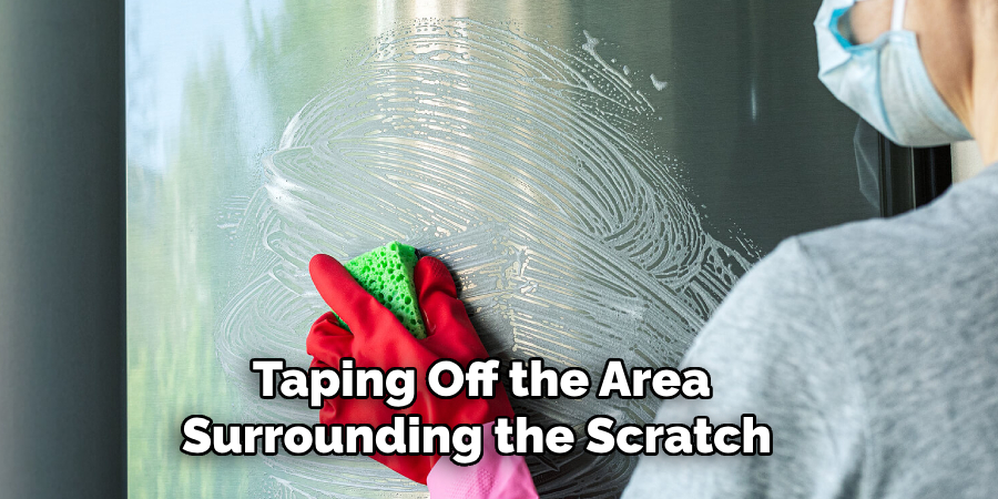 Taping Off the Area Surrounding the Scratch