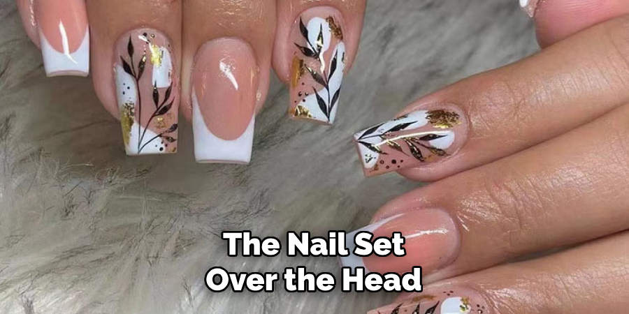 The Nail Set
Over the Head
