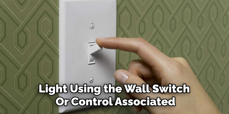Light Using the Wall Switch 
Or Control Associated