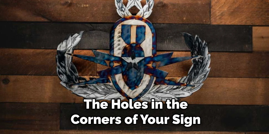 The Holes in the Corners of Your Sign