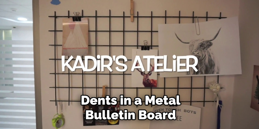 Dents in a Metal Bulletin Board