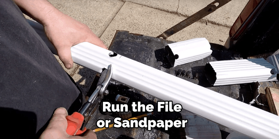 Run the File or Sandpaper