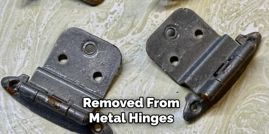  Removed From
 Metal Hinges