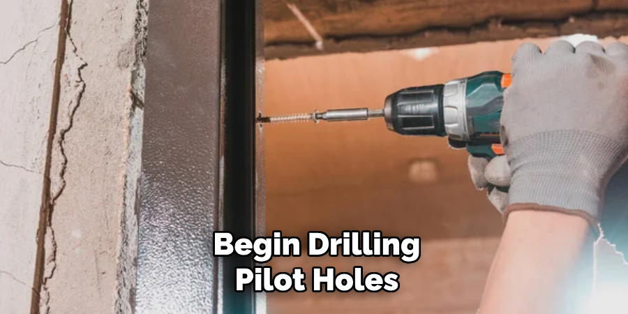 Begin Drilling Pilot Holes