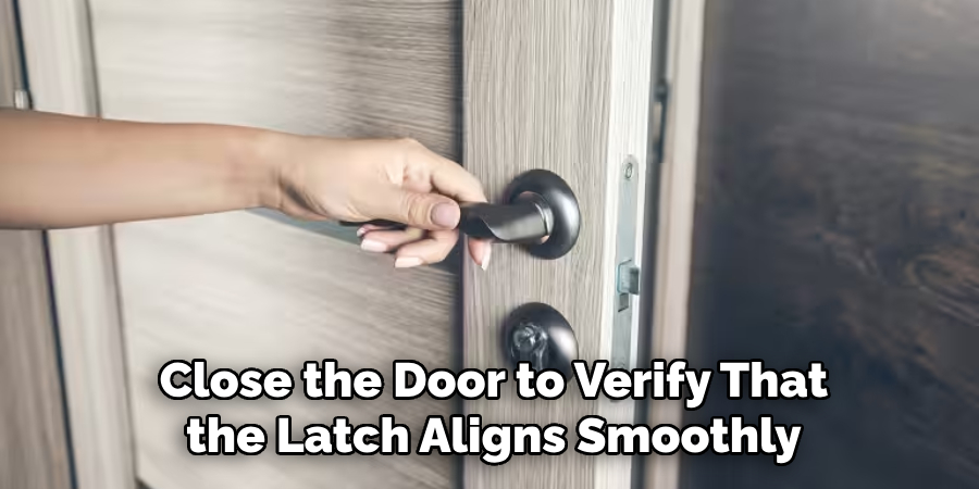 close the door to verify that the latch aligns smoothly