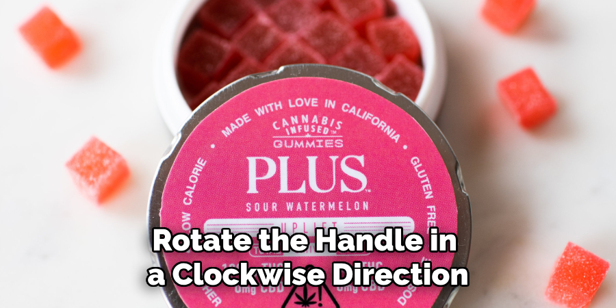 Rotate the Handle in a Clockwise Direction