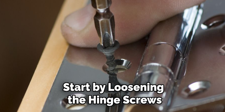 Start by Loosening the Hinge Screws