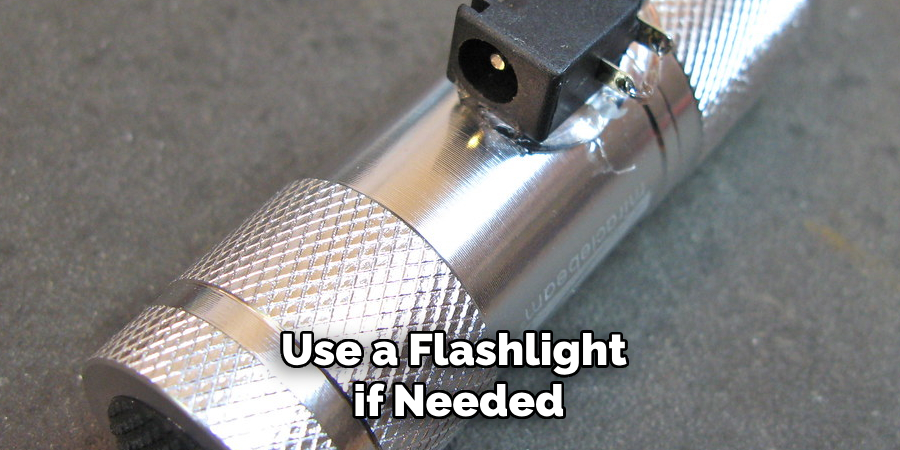 Use a Flashlight if Needed