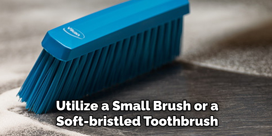 Utilize a Small Brush or a Soft-bristled Toothbrush