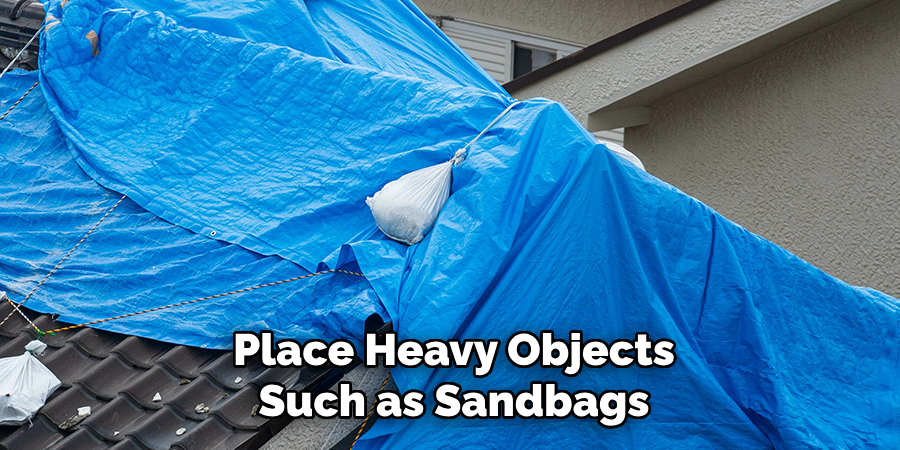 Place Heavy Objects Such as Sandbags